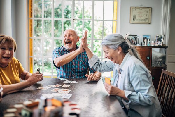 Introducing the TapLook Senior Smile Community Fund 2 enhanced living residents playing cards e1652796167558